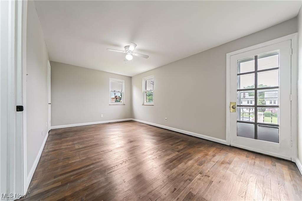 3837 Mayfield Road Cleveland, OH 44121 - Photo 18 of 29 Unfurnished room featuring wood finished floors and ceiling fan
