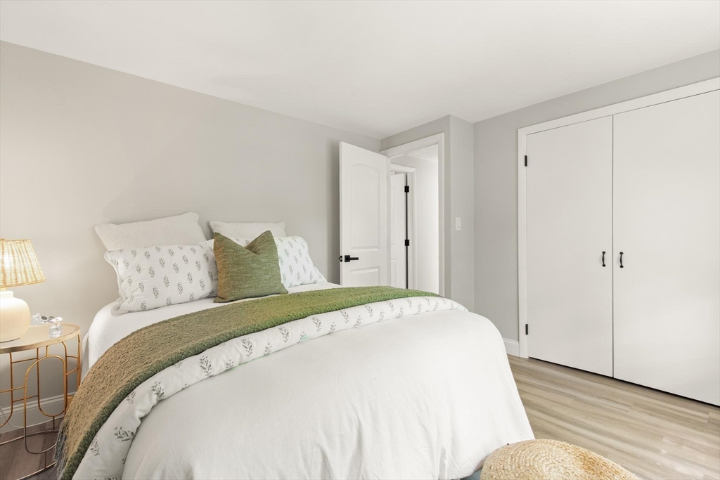 1049 Pleasant Street Canton, MA 02021 - Photo 10 of 16 a large white bed in a white room