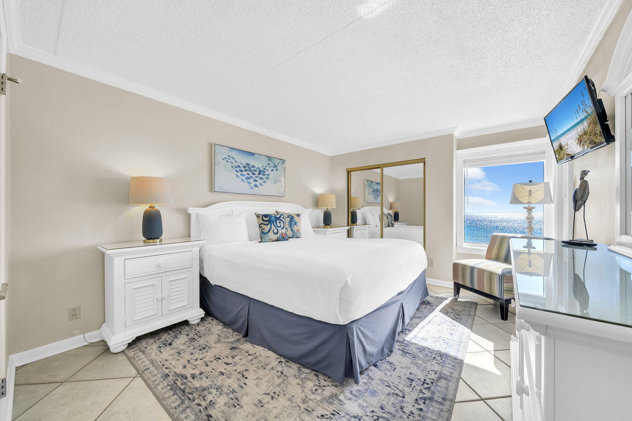 676 Santa Rosa Boulevard, Unit 5F Fort Walton Beach, FL 32548 - Photo 13 of 34 a room with a bed and a view of kitchen