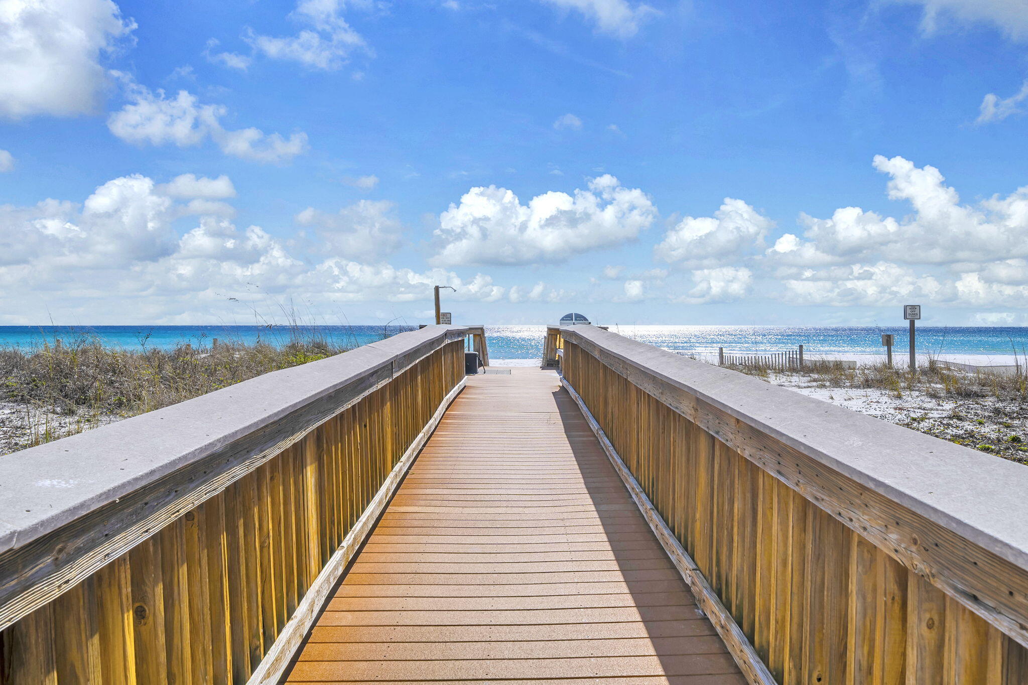 676 Santa Rosa Boulevard, Unit 5F Fort Walton Beach, FL 32548 - Photo 25 of 34 a view of a balcony with wooden fence