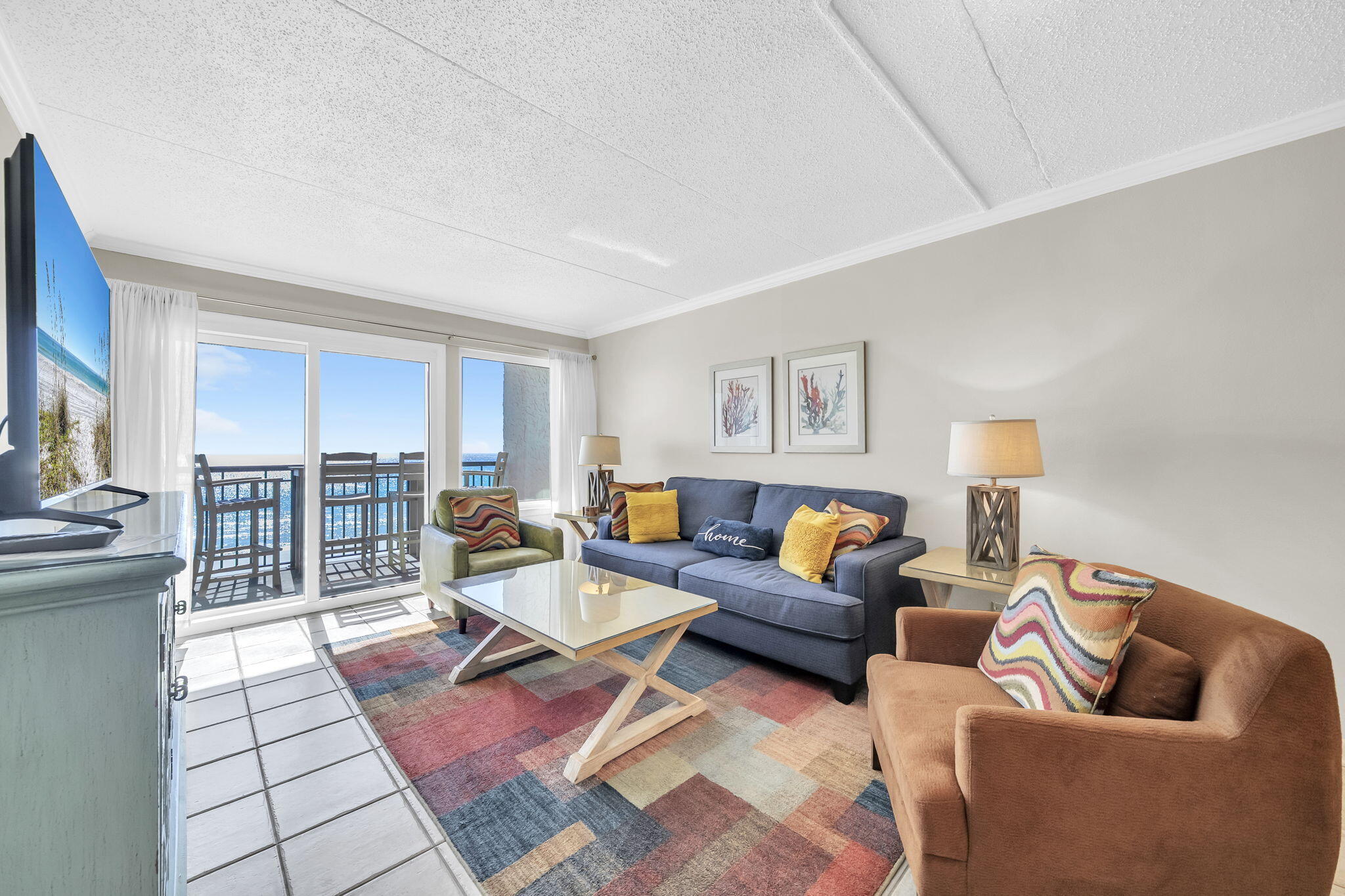 676 Santa Rosa Boulevard, Unit 5F Fort Walton Beach, FL 32548 - Photo 4 of 34 a living room with furniture a rug and a window