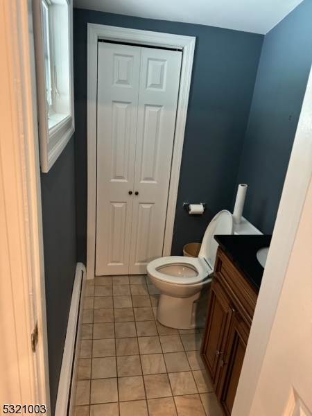 51 Main Street Succasunna, NJ 07876 - Photo 19 of 33 a bathroom with a toilet and a shower