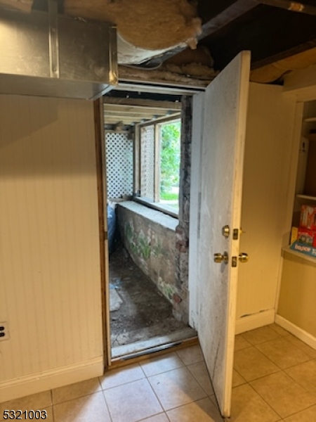 51 Main Street Succasunna, NJ 07876 - Photo 27 of 33 a view of a hallway with wooden door