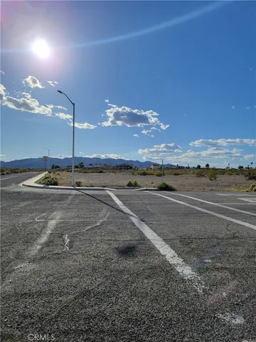 a view of an ocean & mountain