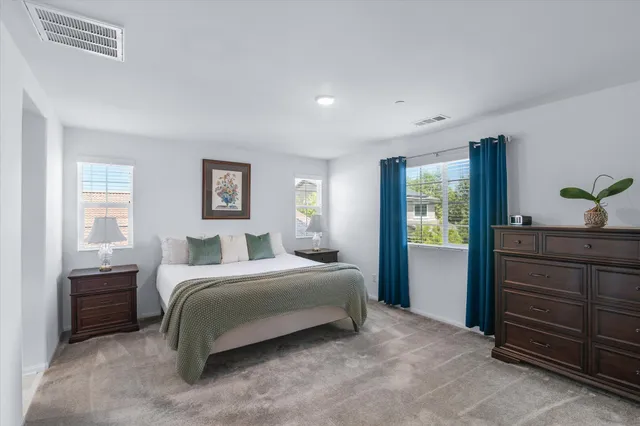 an aerial view of a house with a ocean view