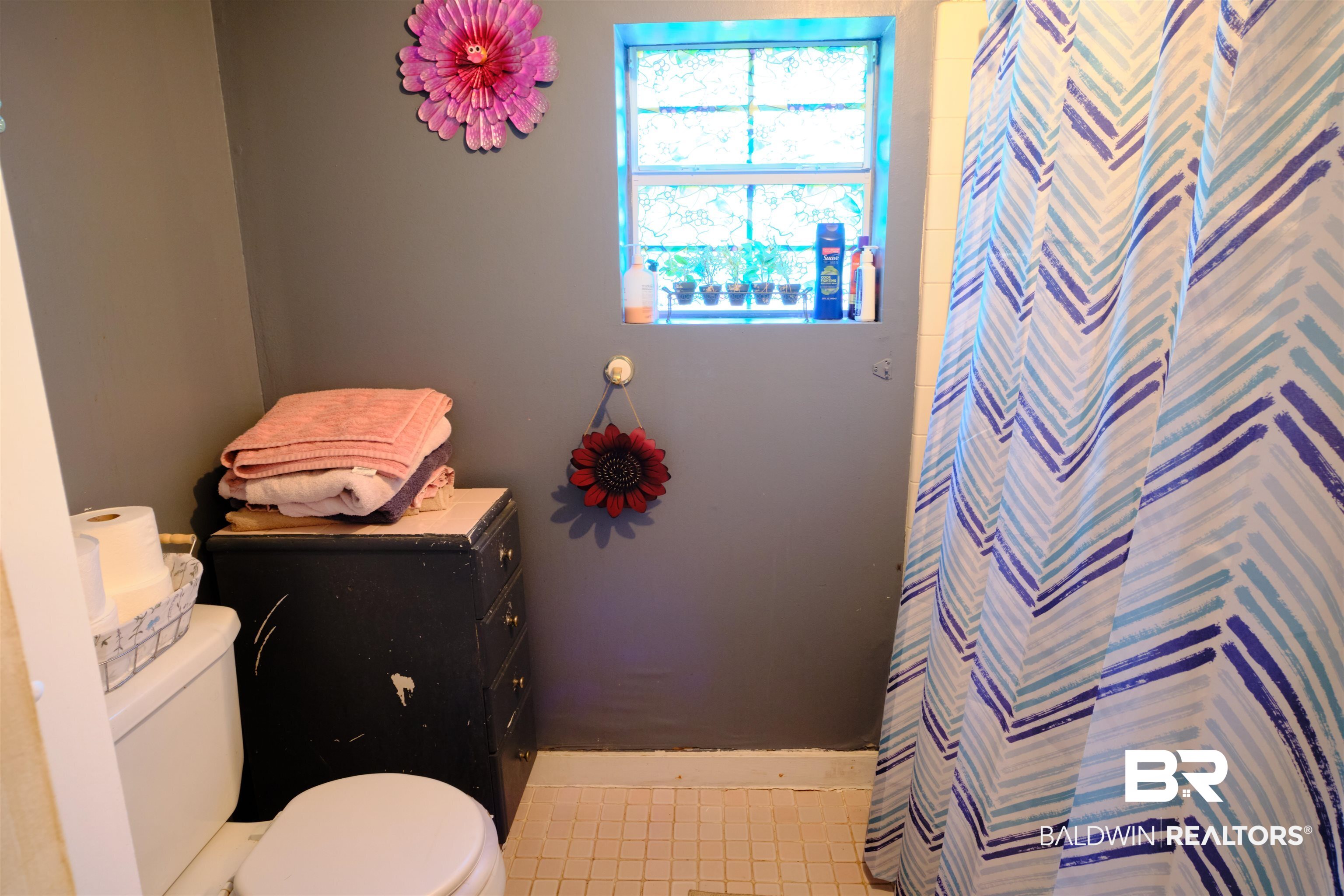 101 West Horner Street Atmore, AL 36502 - Photo 37 of 38 Bathroom with vanity, tile patterned flooring, and toilet