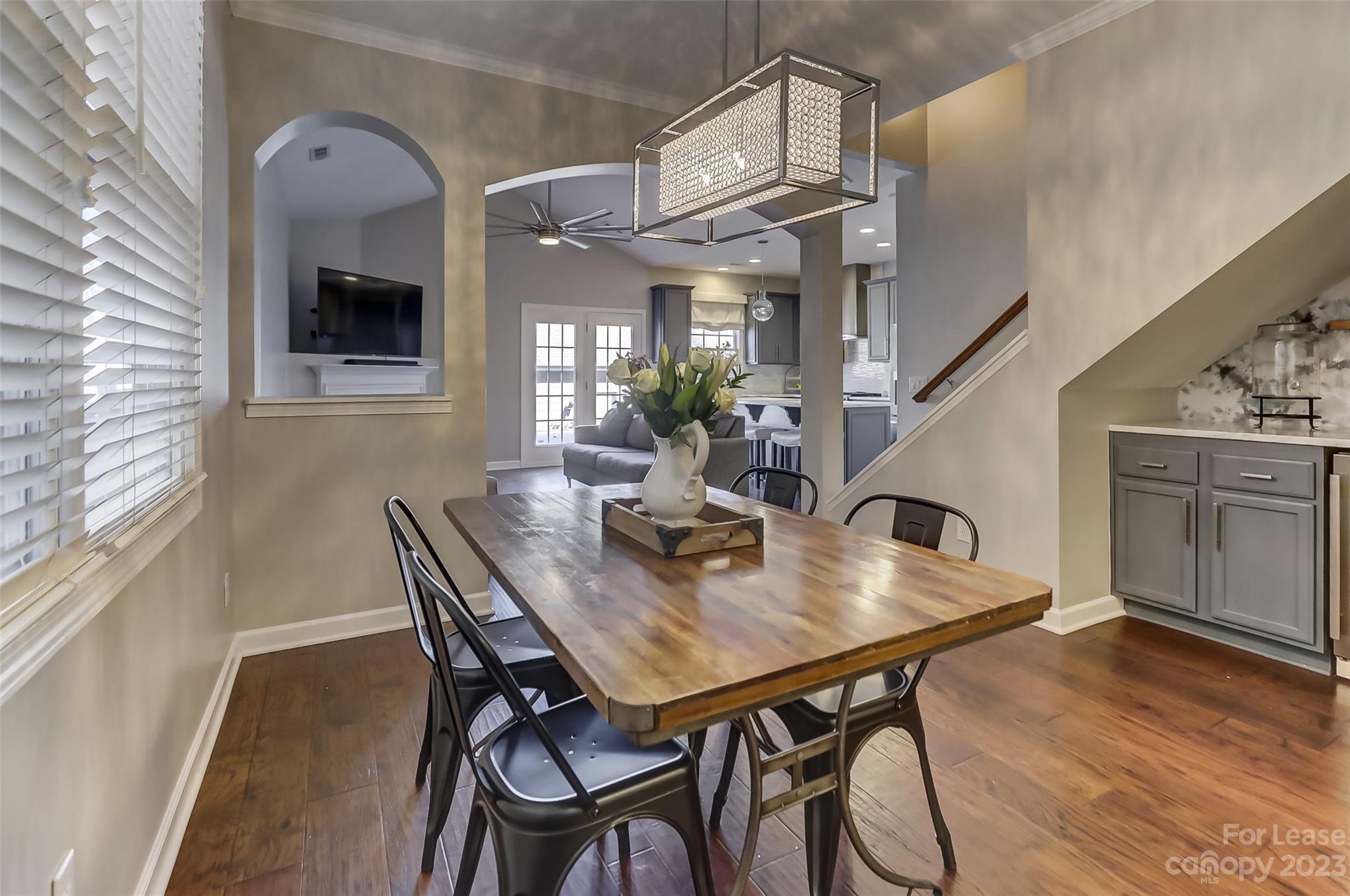 1033 Market Street Fort Mill, SC 29708 - Photo 6 of 48 a view of a dining room with furniture and wooden floor