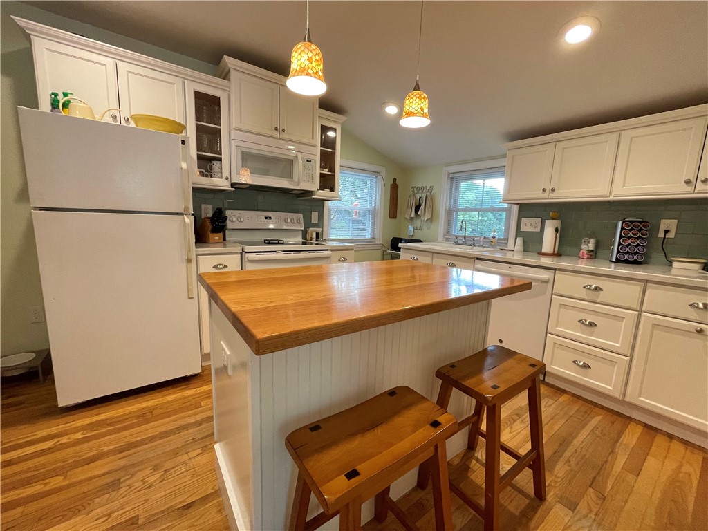 348 Market Street Warren, RI 02885 - Photo 21 of 50 Updated kitchen with center island with very nice storage and drawers.