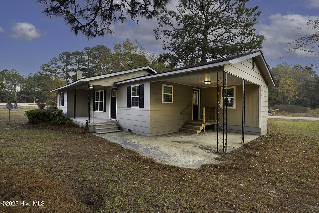 4050 Doc Bennett Road Fayetteville, NC 28306 - Photo 3 of 26 586A0307-Edit