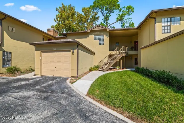 a view of a house with a patio