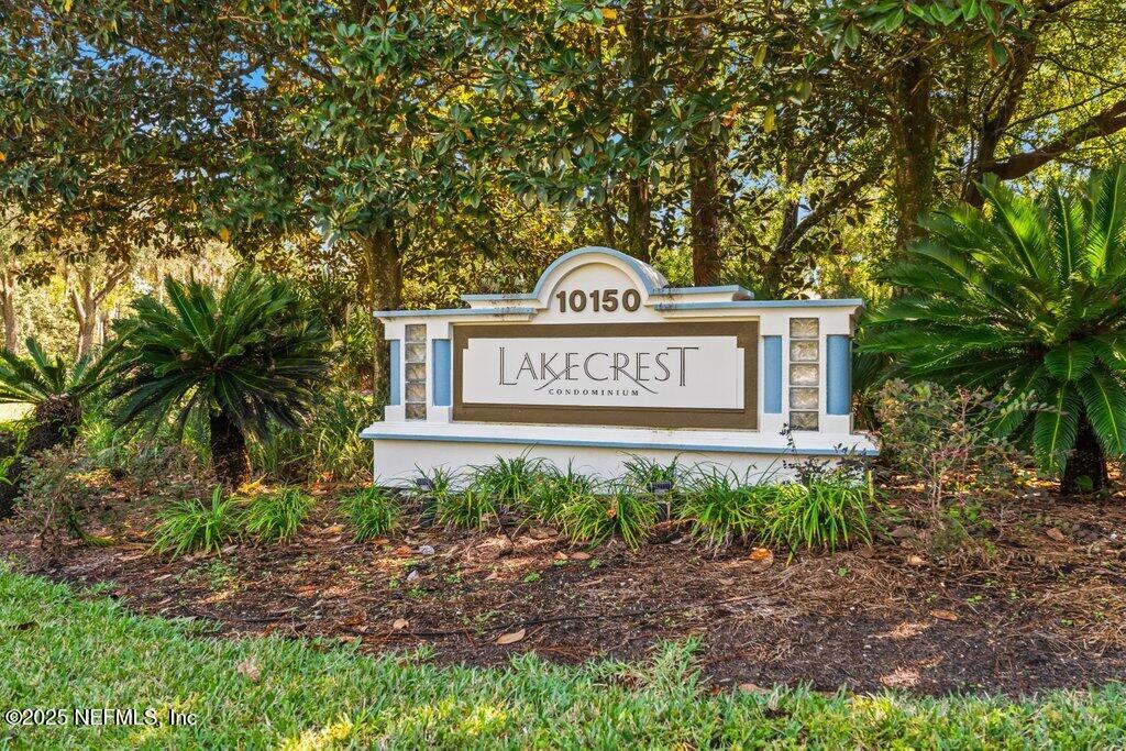 10150 Belle Rive Boulevard, Unit 303 Jacksonville, FL 32256 - Photo 18 of 23 a sign on the side of a road