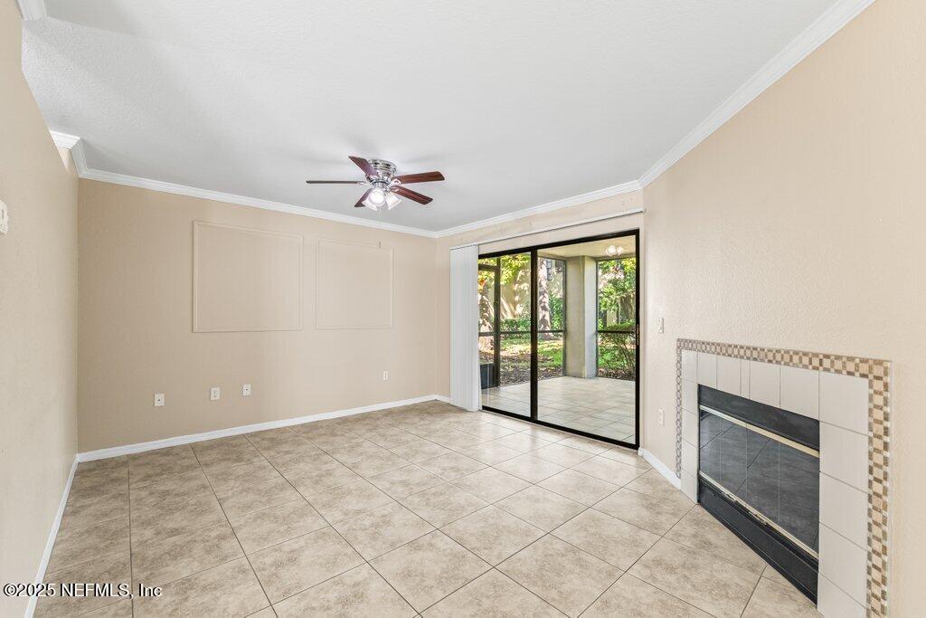 10150 Belle Rive Boulevard, Unit 303 Jacksonville, FL 32256 - Photo 4 of 23 a view of an empty room with a window