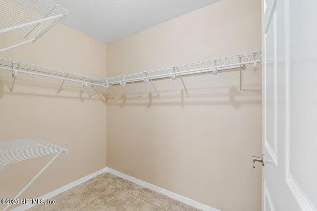 a view of a room with racks on the wall