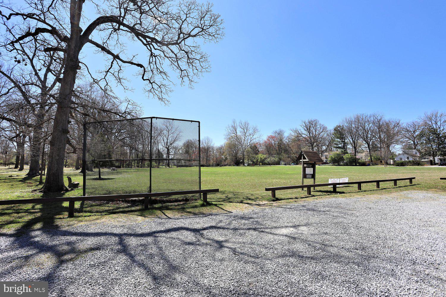 16 Maple Avenue Washington Grove, MD 20880 - Photo 47 of 58 Spacious park under a clear blue sky.
