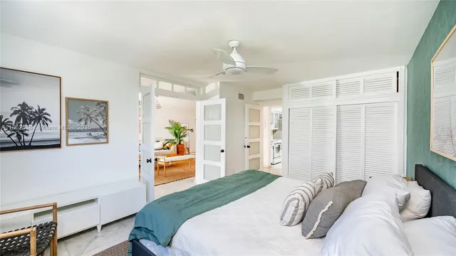 a bedroom with furniture and window