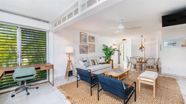 a view of a livingroom with furniture