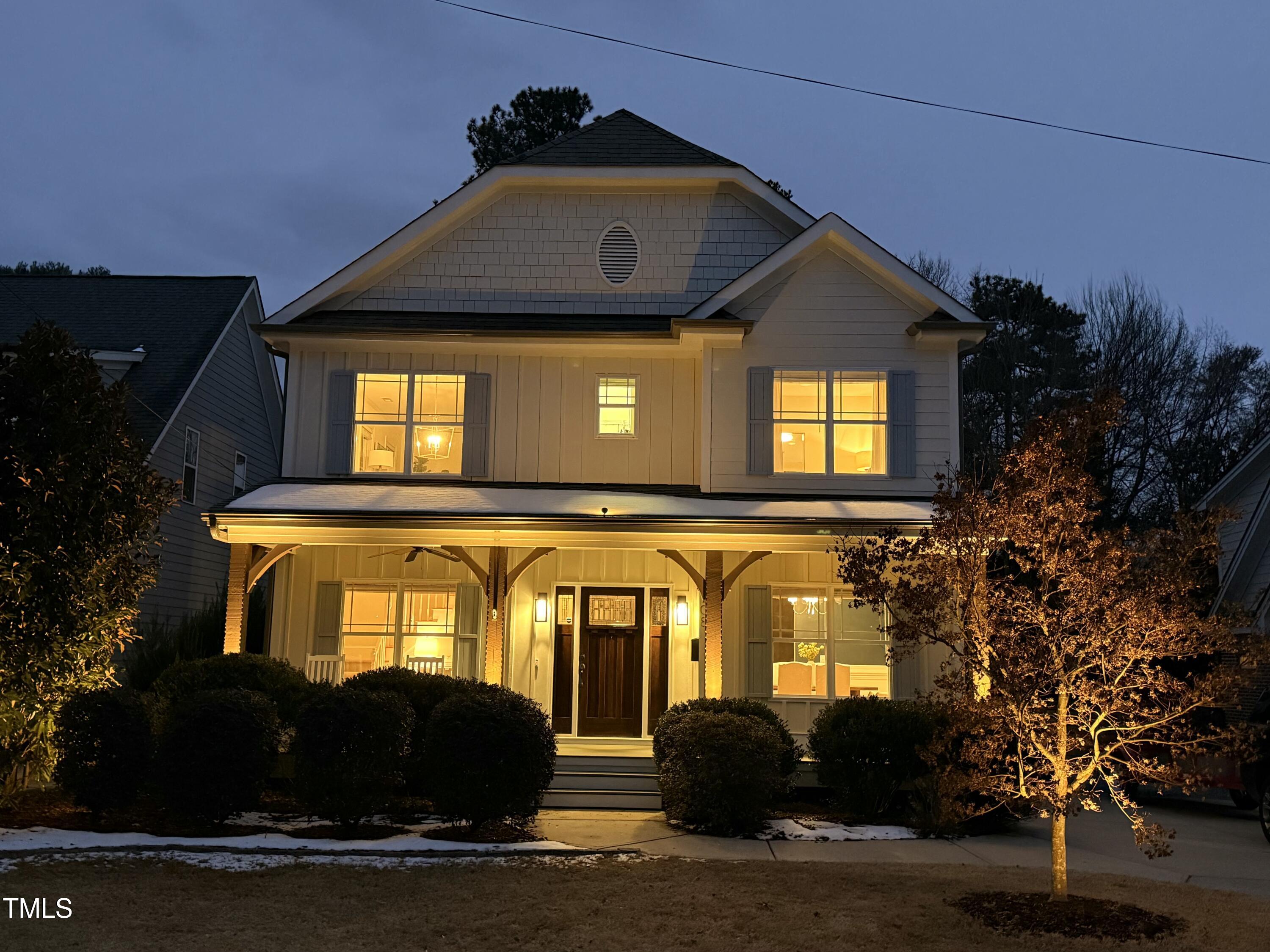 708 Kimbrough Street Raleigh, NC 27608 - Photo 33 of 36 a front view of a house with a yard