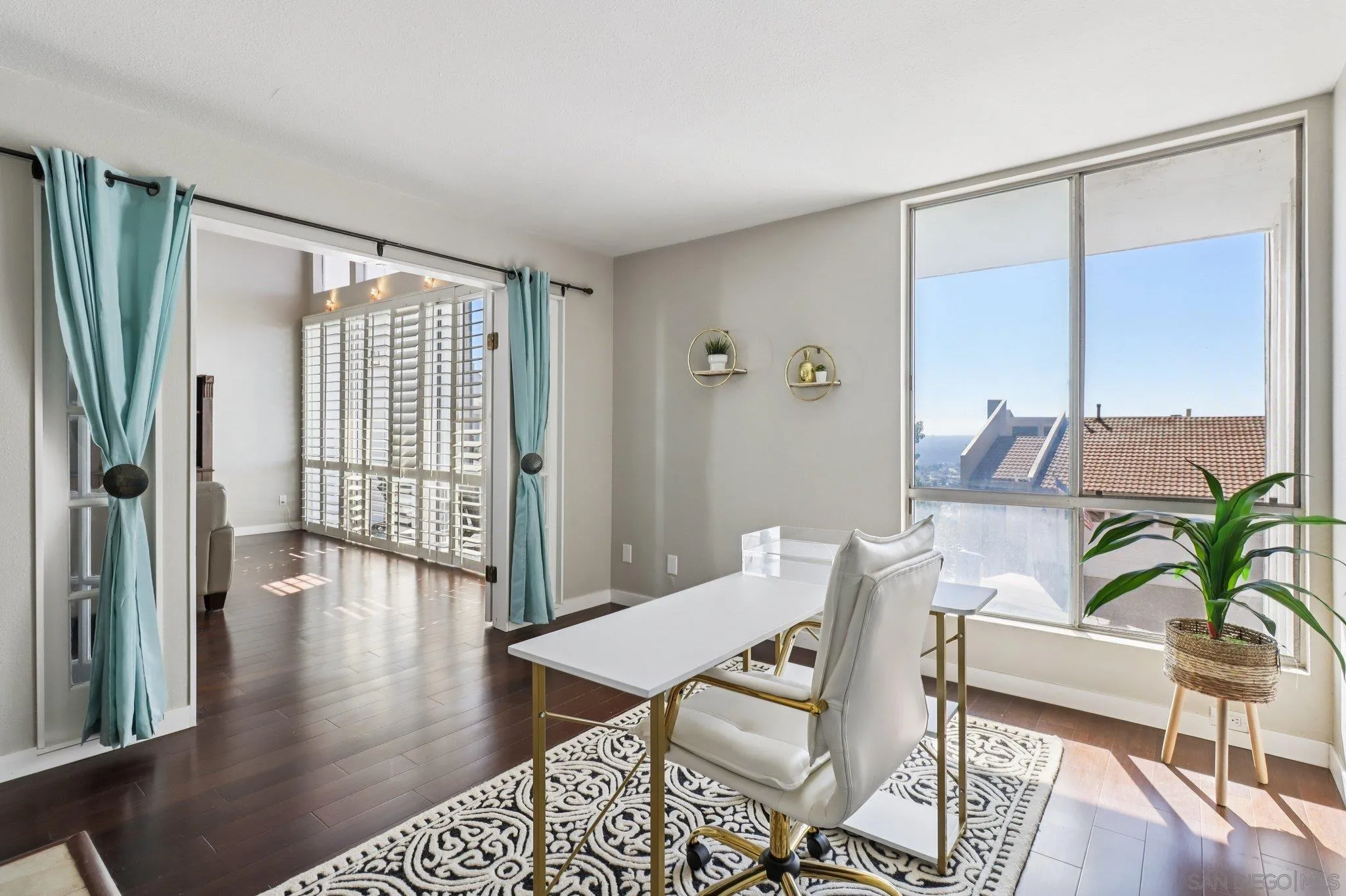 6329 Caminito Estrellado San Diego, CA 92120 - Photo 12 of 61 a view of a livingroom with furniture and floor to ceiling window