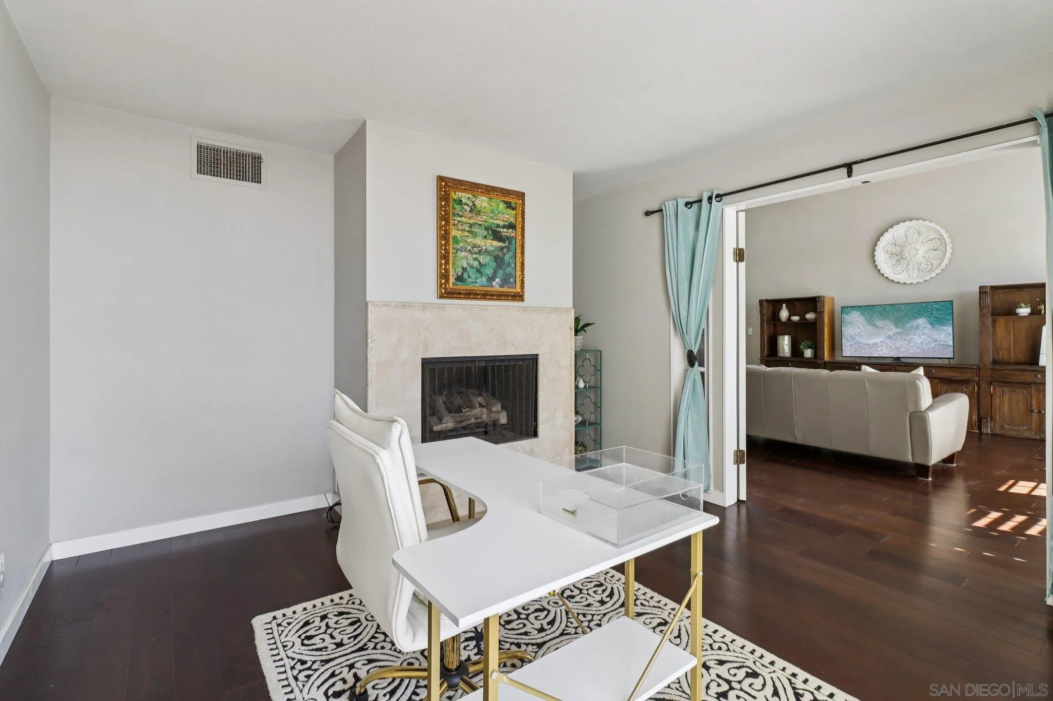 6329 Caminito Estrellado San Diego, CA 92120 - Photo 13 of 61 a living room with furniture and a fireplace