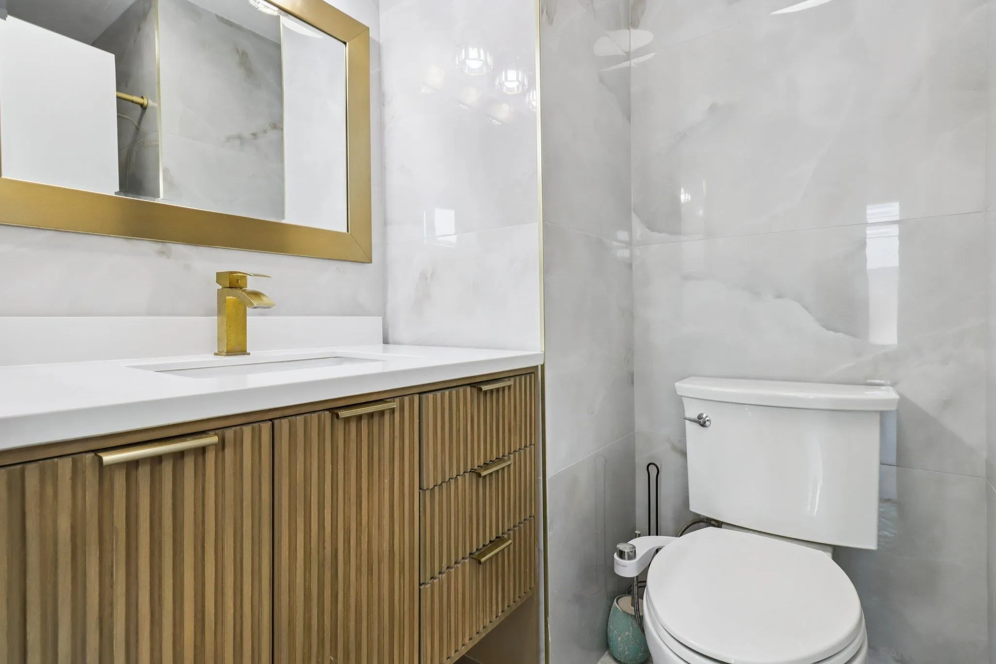 6329 Caminito Estrellado San Diego, CA 92120 - Photo 40 of 61 a bathroom with a sink a toilet and shower