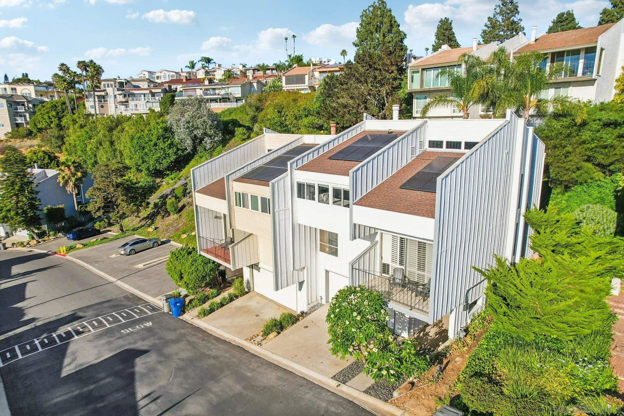 6329 Caminito Estrellado San Diego, CA 92120 - Photo 48 of 61 a aerial view of a house with a yard and plants