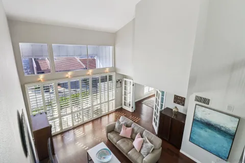a view of a living room with furniture