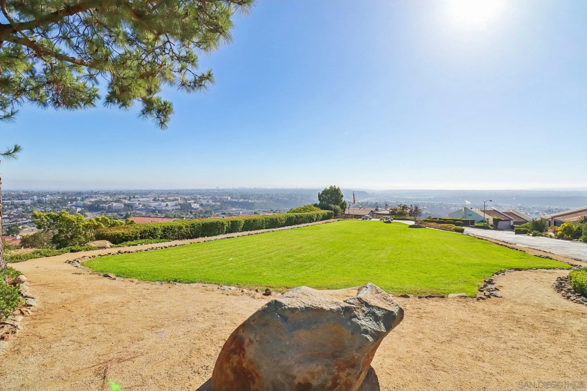6329 Caminito Estrellado San Diego, CA 92120 - Photo 56 of 61 a view of a swimming pool and an ocean