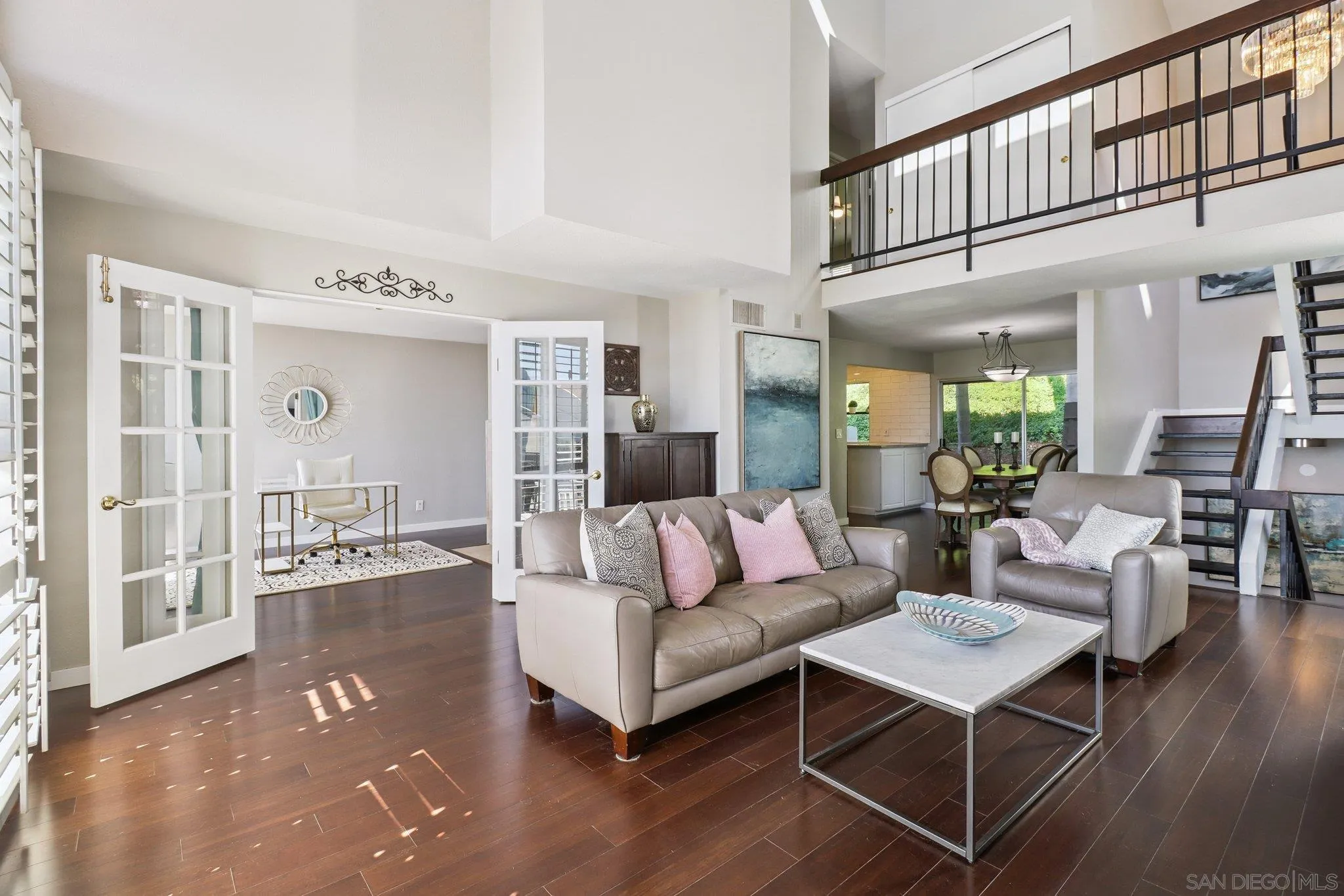 6329 Caminito Estrellado San Diego, CA 92120 - Photo 9 of 61 a living room with furniture and wooden floor