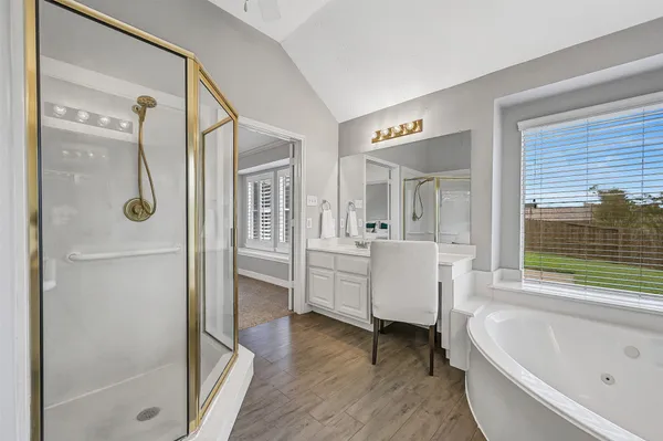 a bed room with a bed and a window