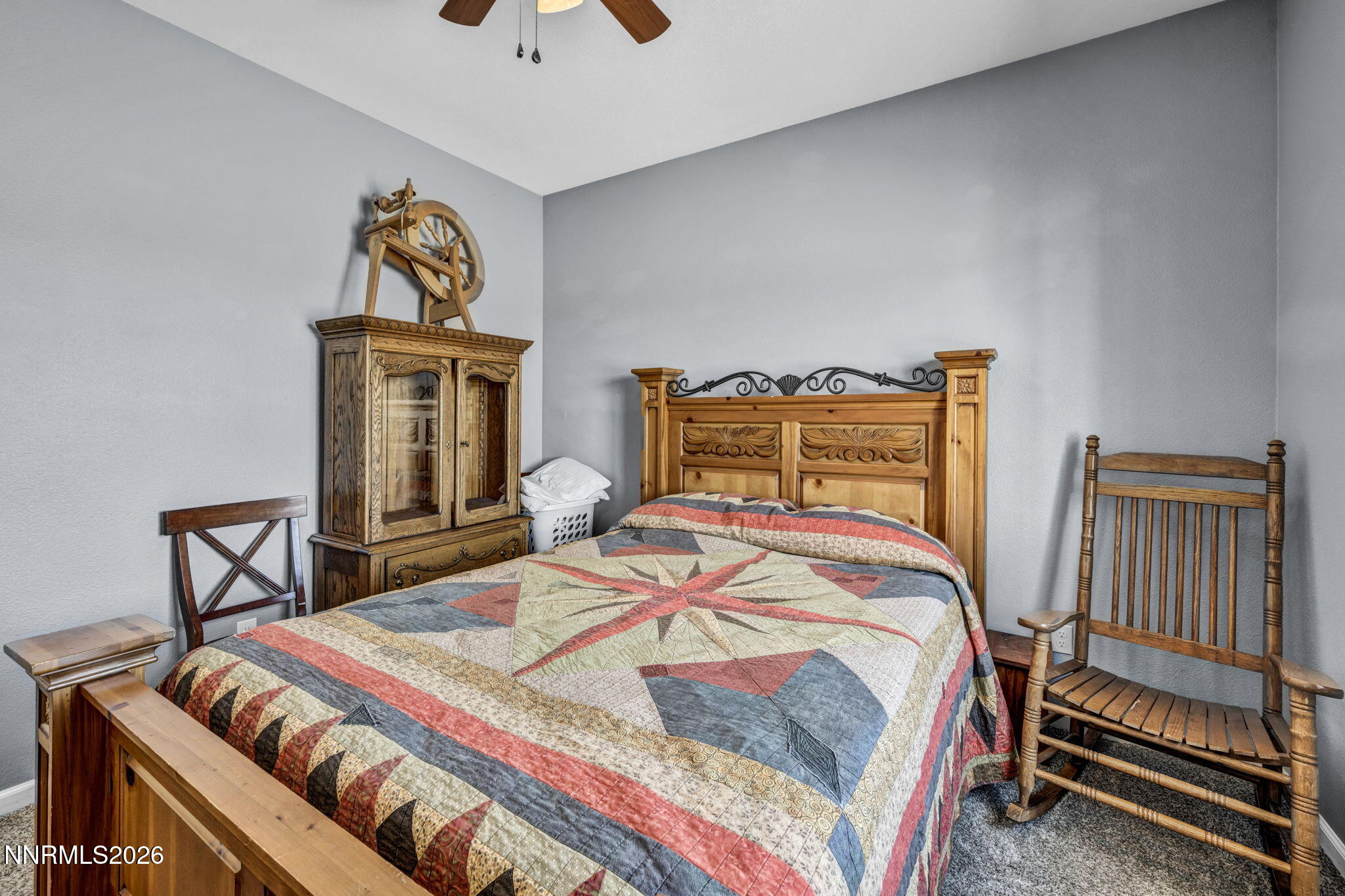 1286 Sky Ridge Drive Fallon, NV 89406 - Photo 36 of 49 a bedroom with a bed and a dresser in it