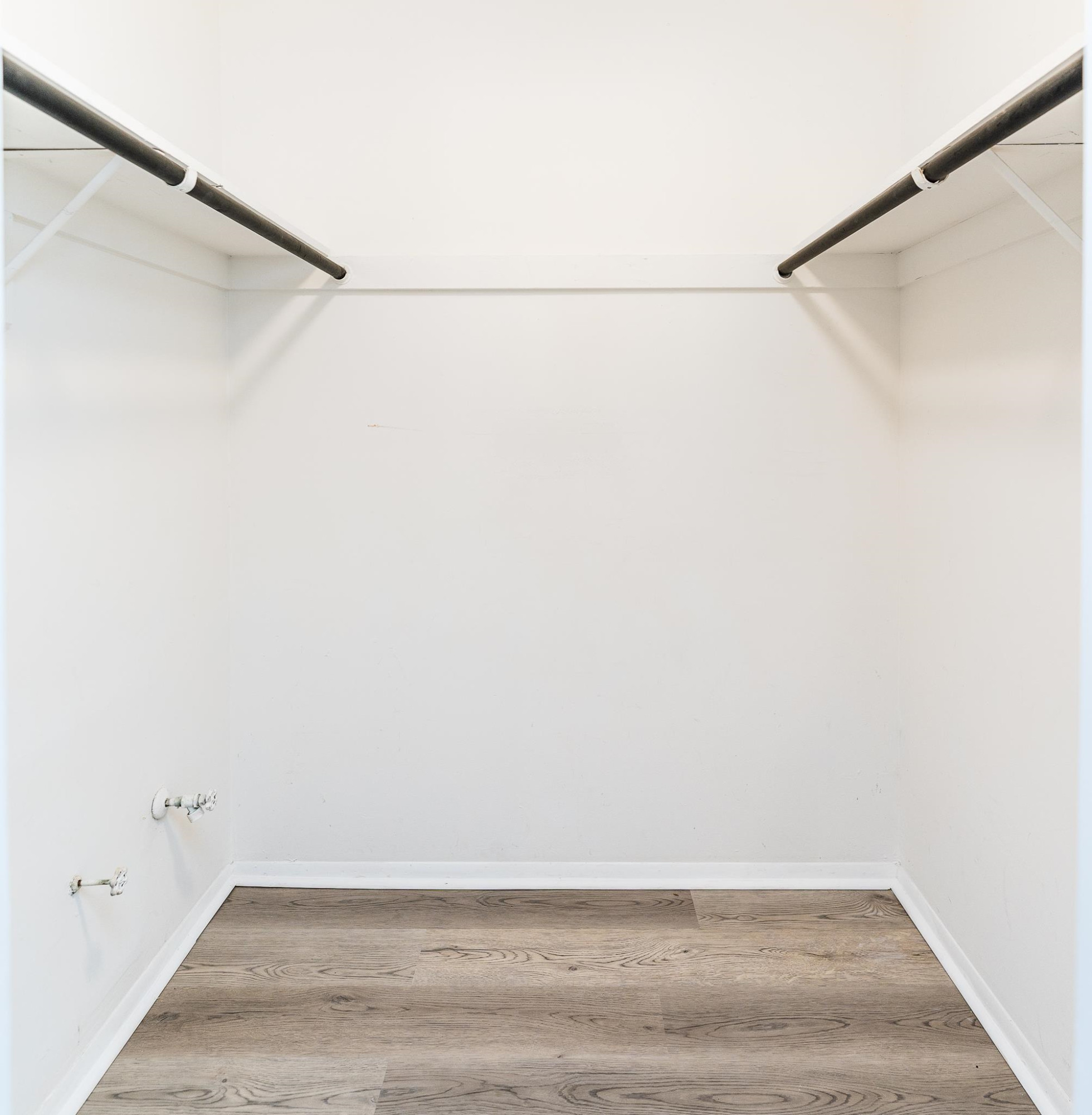 1281 Schaub Drive, Unit G Raleigh, NC 27606 - Photo 7 of 10 a view of small space with racks on the wall