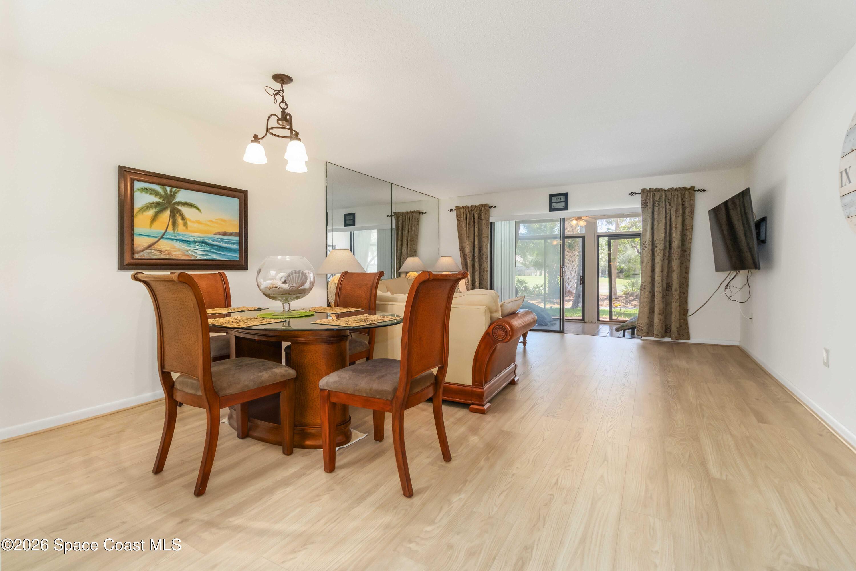 227 Augusta Way Melbourne, FL 32940 - Photo 15 of 38 a view of a dining room with furniture
