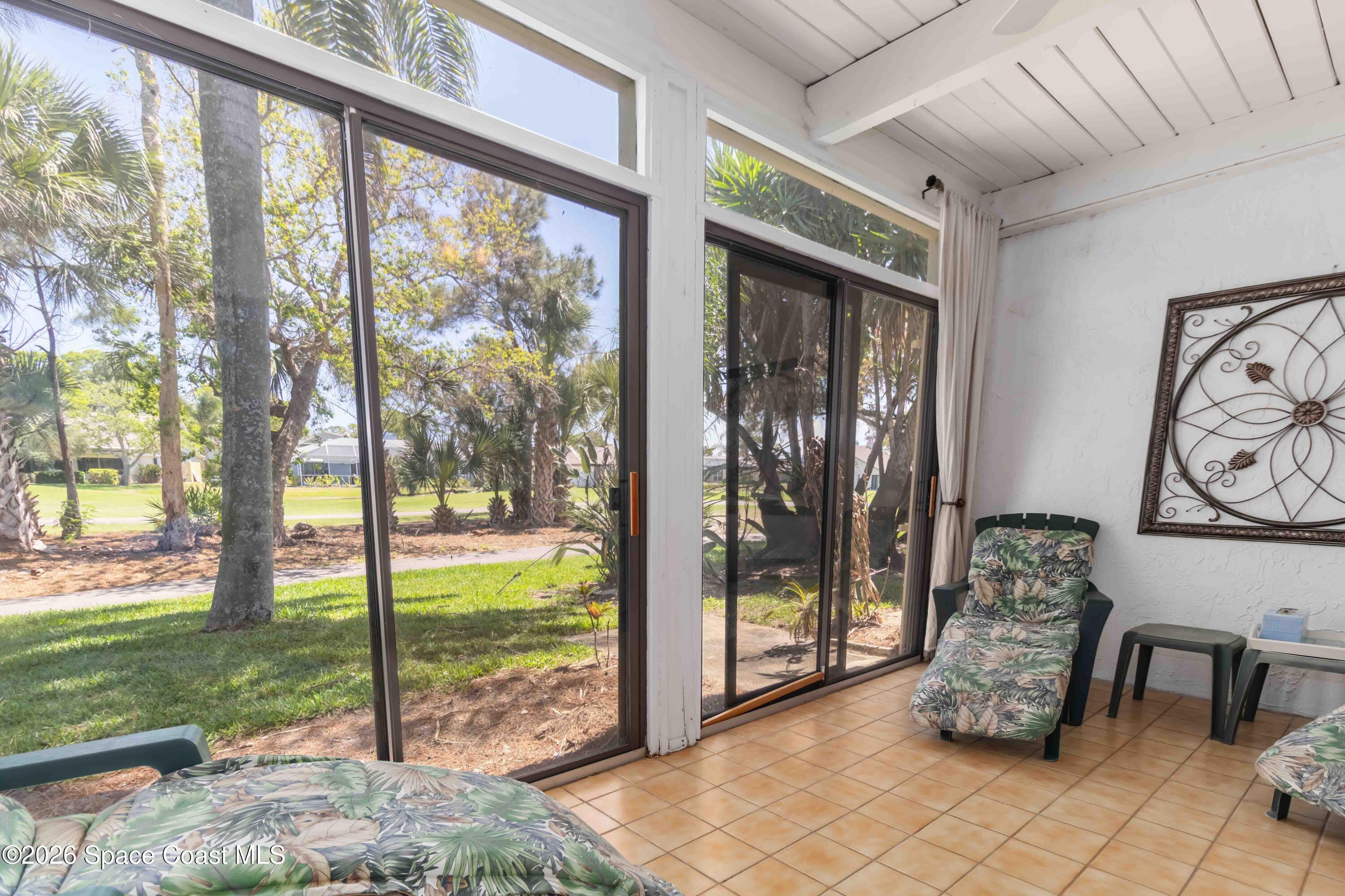 227 Augusta Way Melbourne, FL 32940 - Photo 31 of 38 a room with garden view and living room view