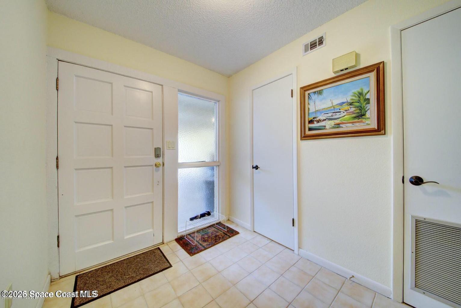 227 Augusta Way Melbourne, FL 32940 - Photo 5 of 38 a view of an empty room