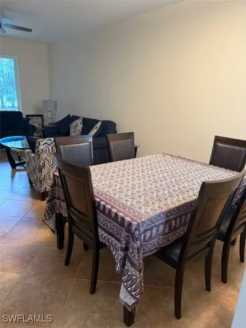 a bedroom with a bed and a table in it