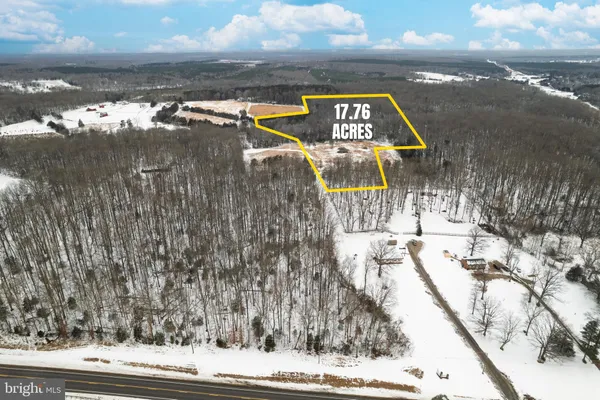a view of swimming pool with outdoor space and seating