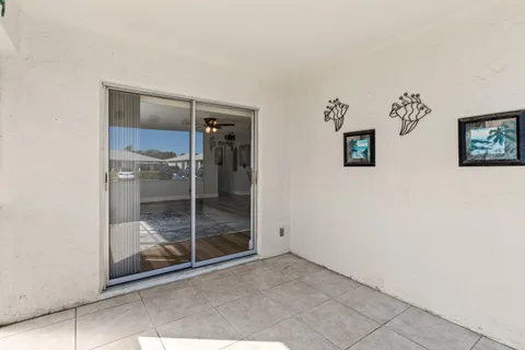 a view of a glass door and a glass door