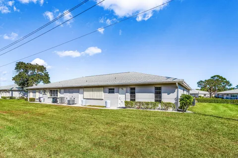a front view of house with yard