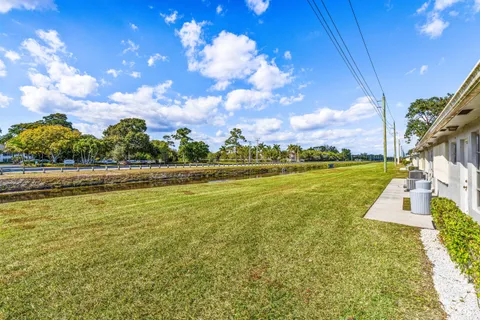 a view of a lake with a big yard