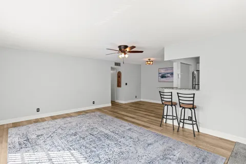 a view of a workspace with furniture