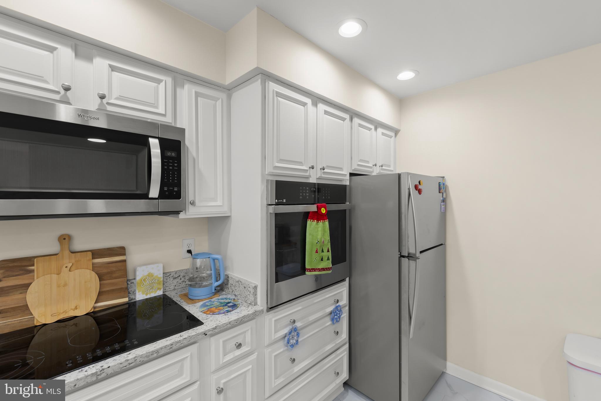 250 Co Rte 340/7 Charles Town, WV 25414 - Photo 13 of 42 a kitchen with stainless steel appliances a refrigerator sink and microwave