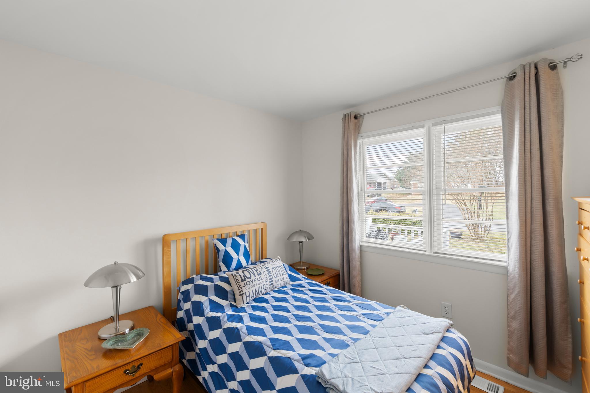 250 Co Rte 340/7 Charles Town, WV 25414 - Photo 15 of 42 a bedroom with a bed and window