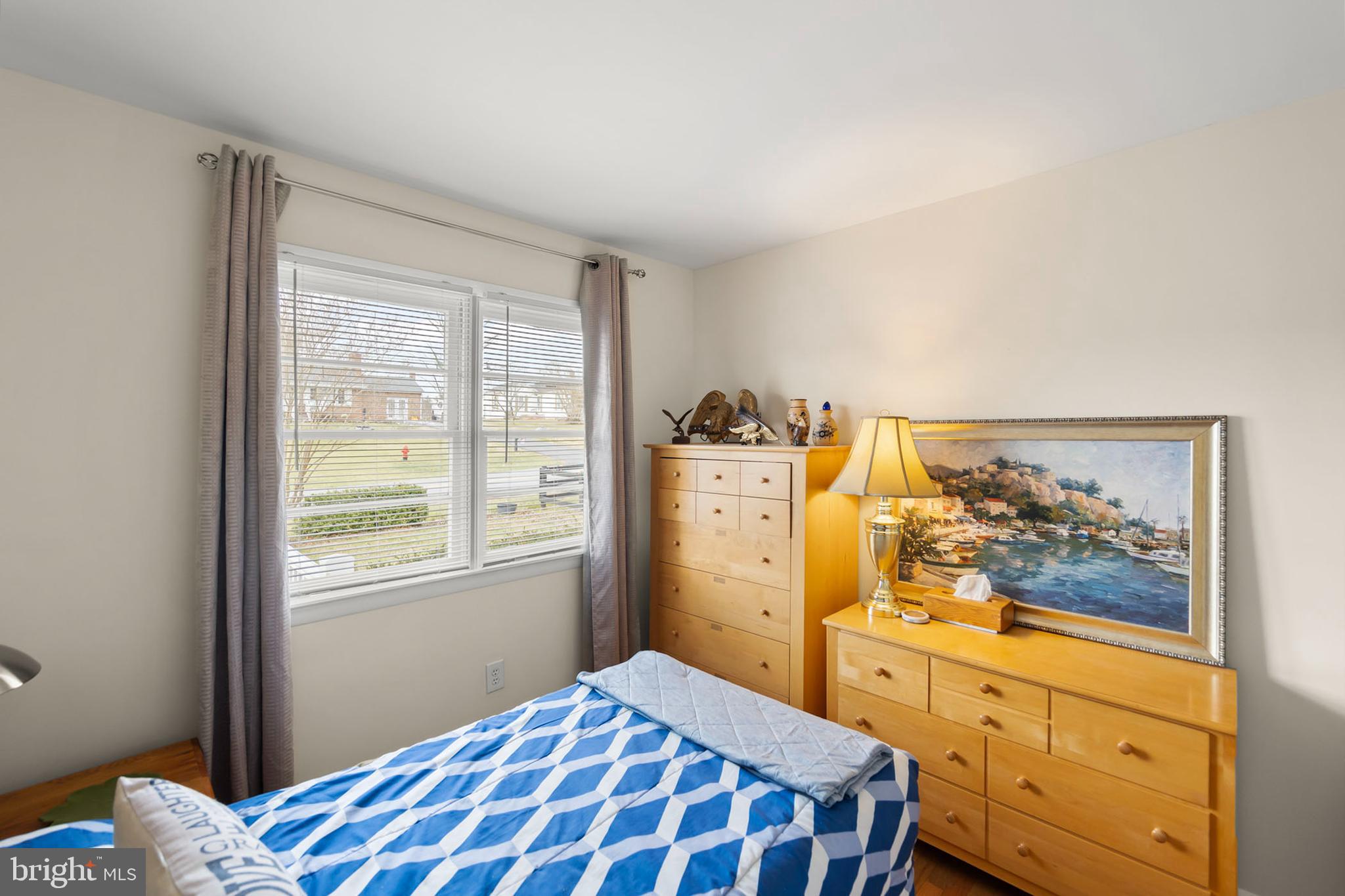 250 Co Rte 340/7 Charles Town, WV 25414 - Photo 16 of 42 a bedroom with a bed and wooden floor