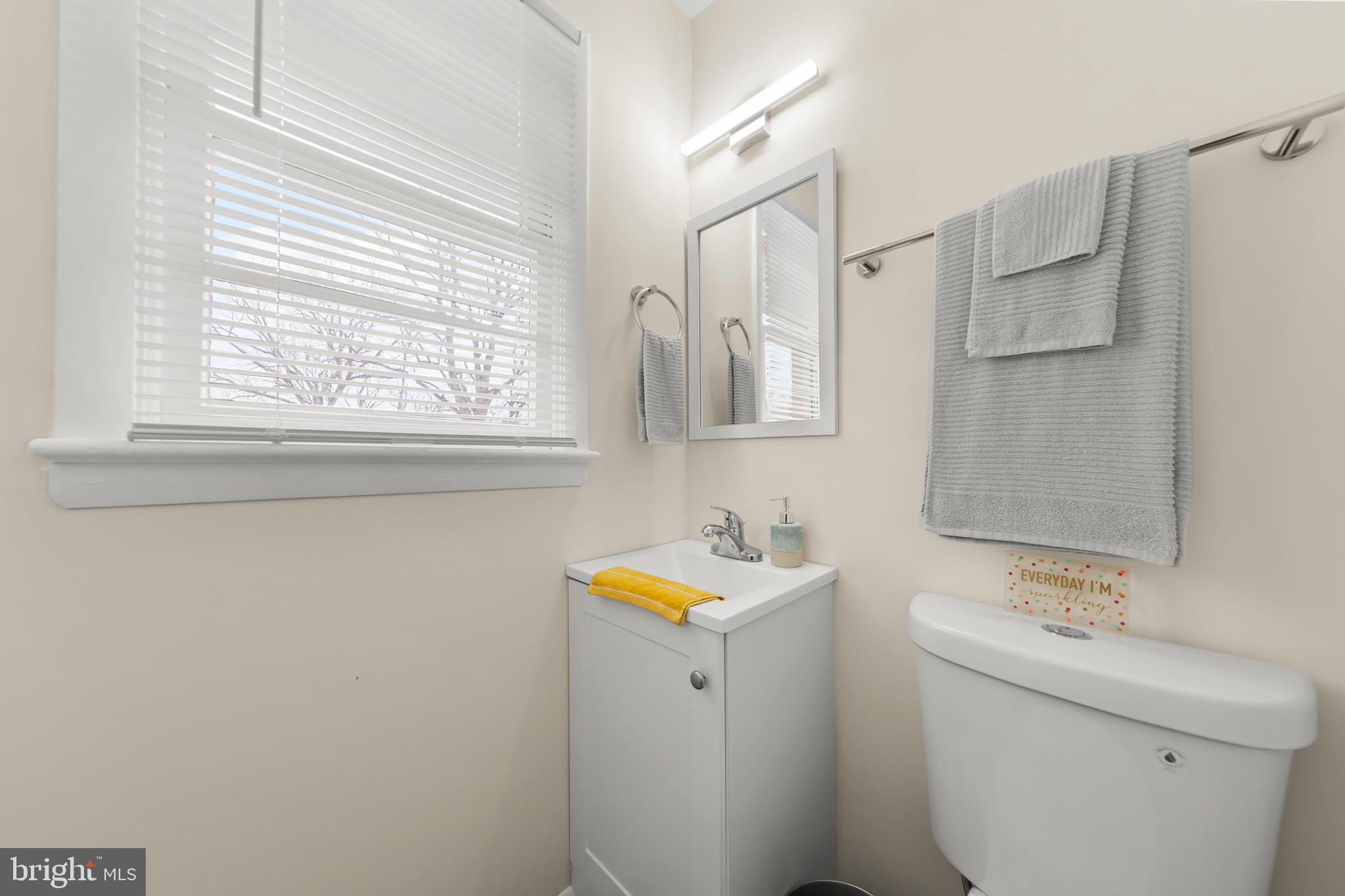250 Co Rte 340/7 Charles Town, WV 25414 - Photo 21 of 42 a bathroom with double sink and mirror with window