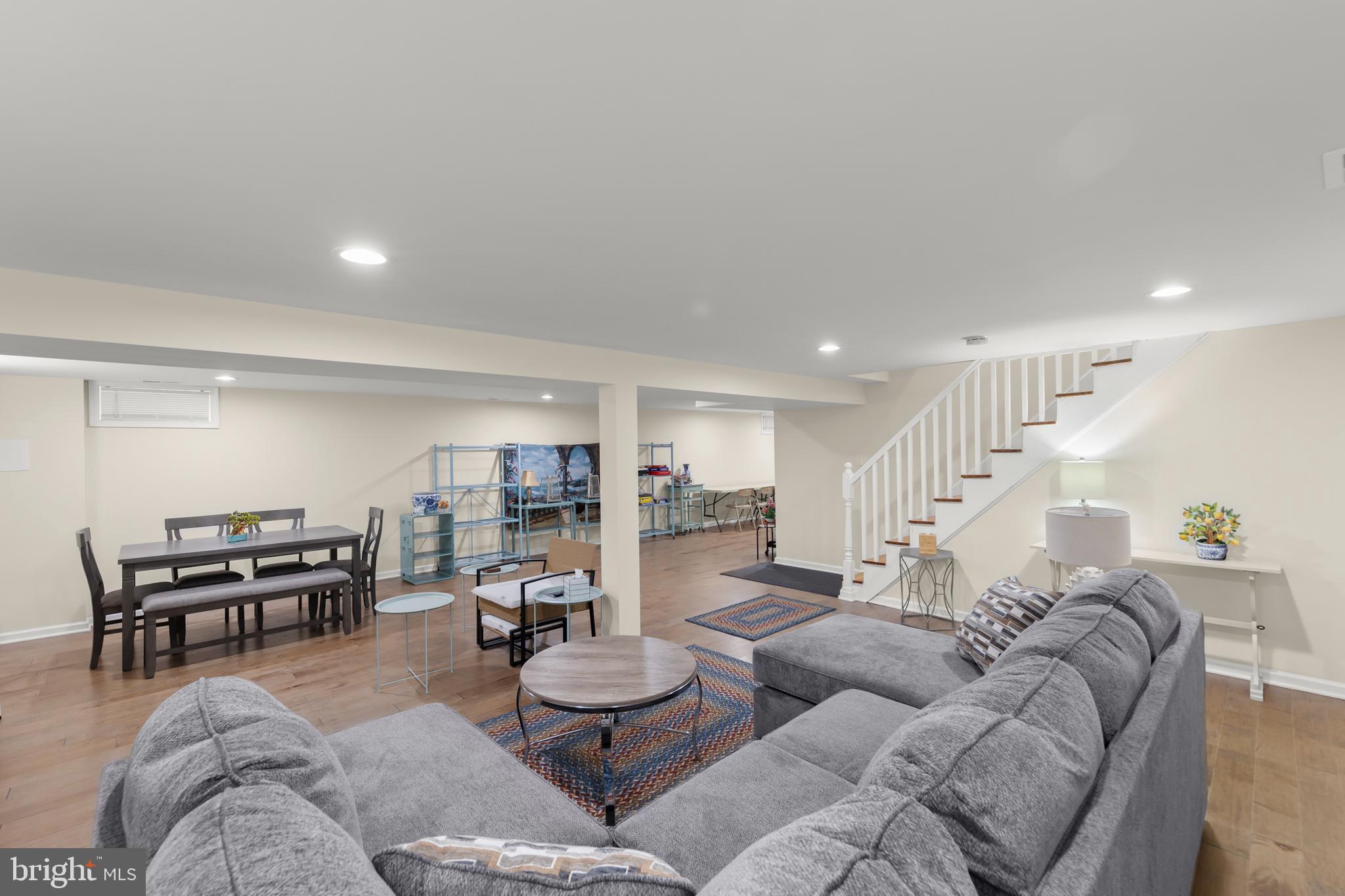 250 Co Rte 340/7 Charles Town, WV 25414 - Photo 29 of 42 a living room with furniture and a dining table with kitchen view