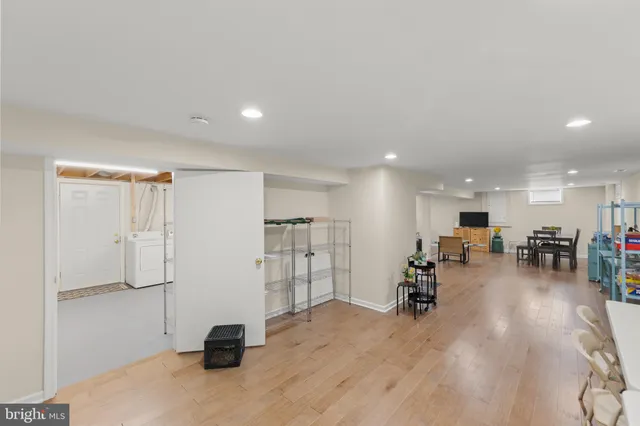 a view of a storage & utility room with furniture and toys