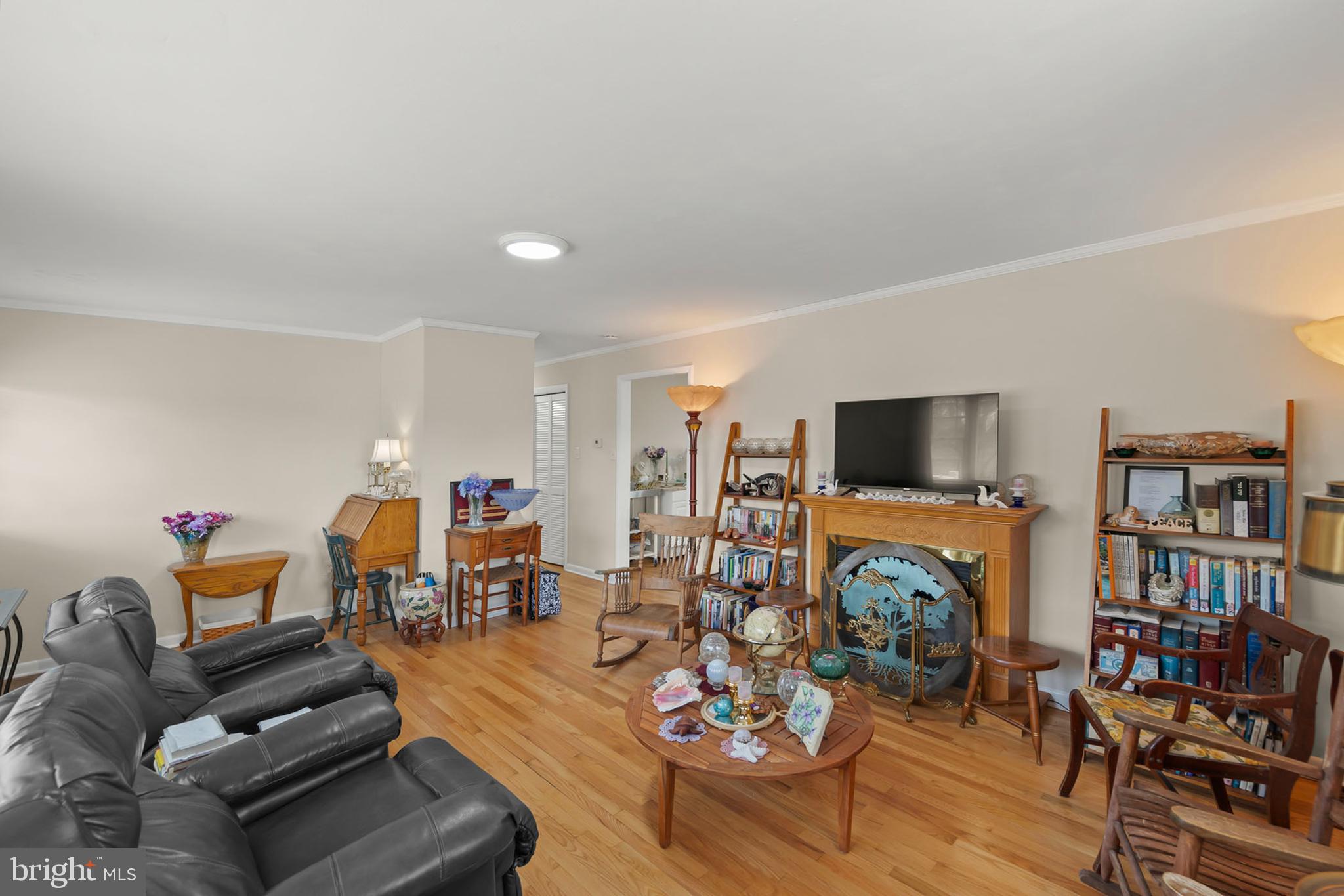 250 Co Rte 340/7 Charles Town, WV 25414 - Photo 3 of 42 a living room with furniture a flat screen tv and a fireplace