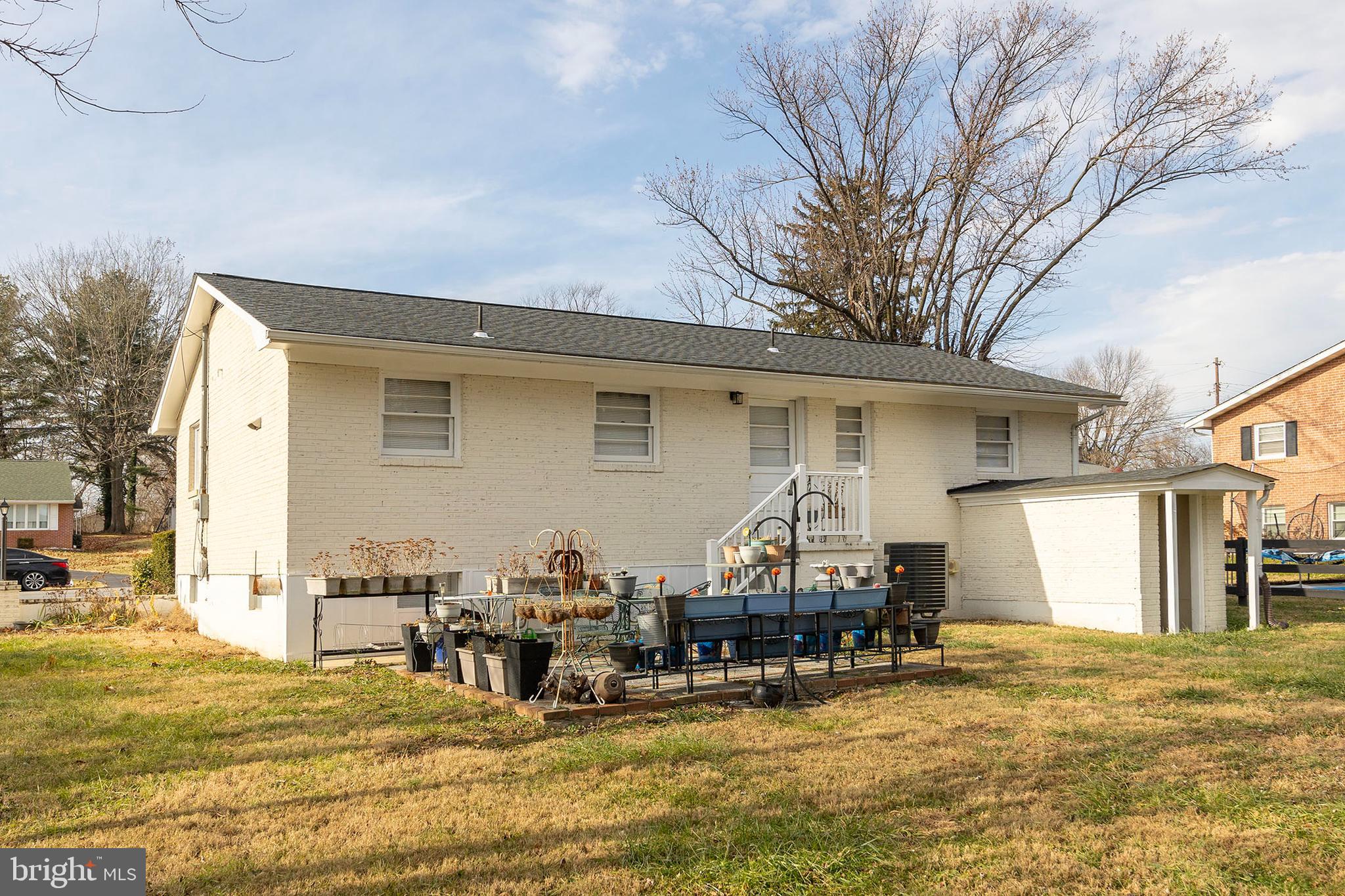 250 Co Rte 340/7 Charles Town, WV 25414 - Photo 37 of 42 a view of a dinning table and chairs in patio
