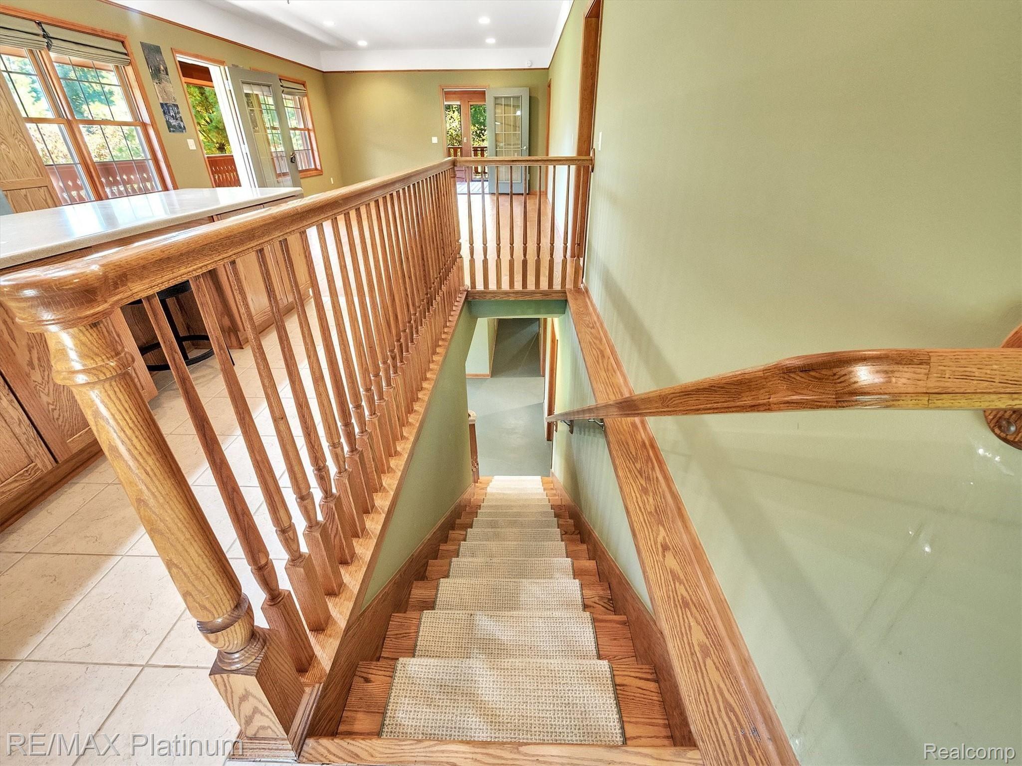 11061 Wiggins Road Howell, MI 48855 - Photo 27 of 79 BEAUTIFUL WOOD RAILING AND OAK STEPS