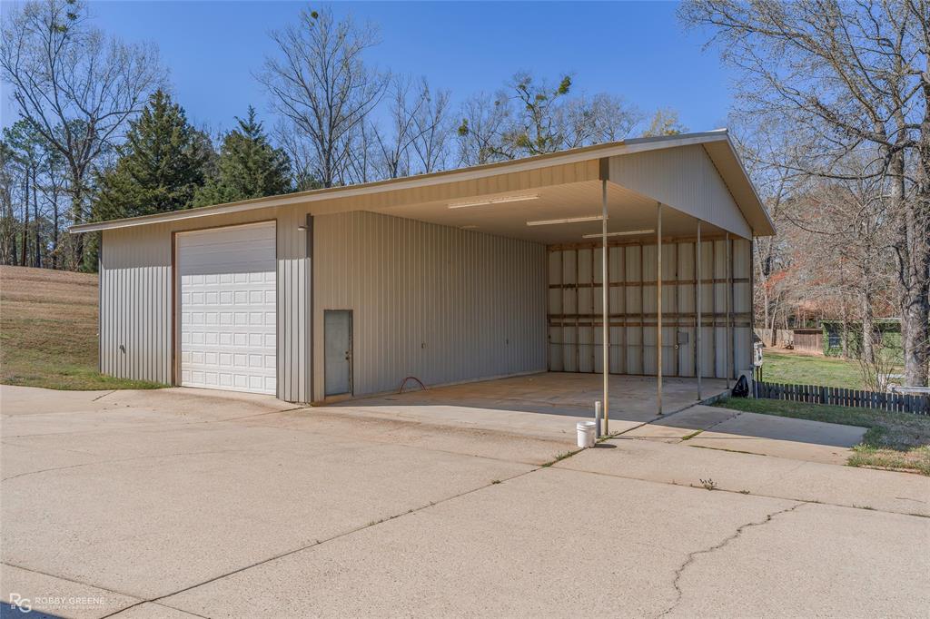 703 Airport Loop Homer, LA 71040 - Photo 23 of 29 30 x 40 shop with electric and full bath